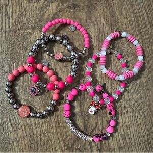 Six hot pink stretchy bracelets. Excellent condition.
